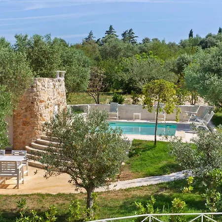 Деревянный коттедж Trullo Sole Путиньяно
